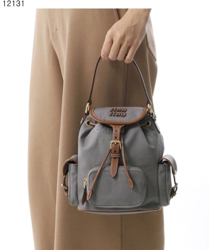 미우미우  캔버스 및 가죽백팩  